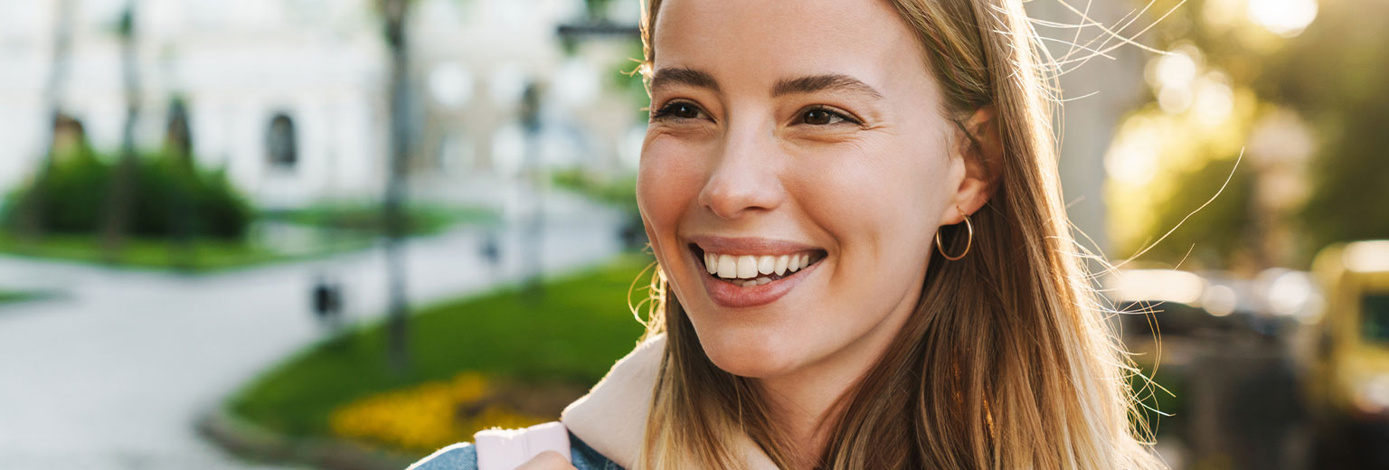 Woman smiling after Teeth Whitening