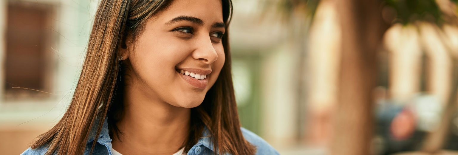 Woman smiling after Composite Fillings