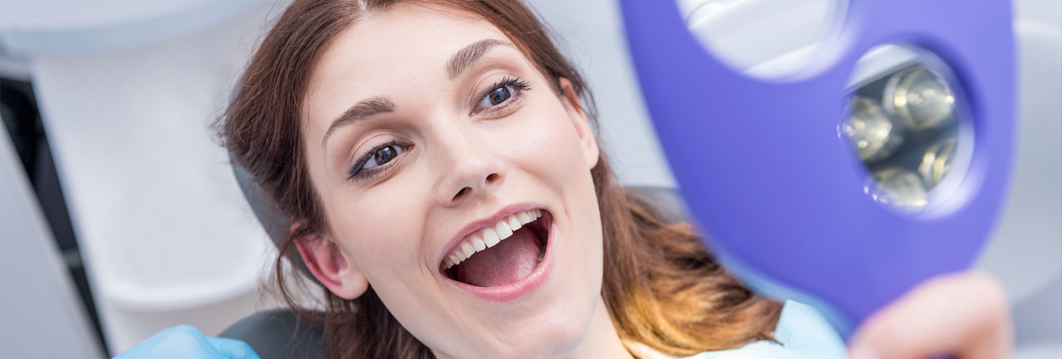 Woman Smiling after Orthodontic Treatment