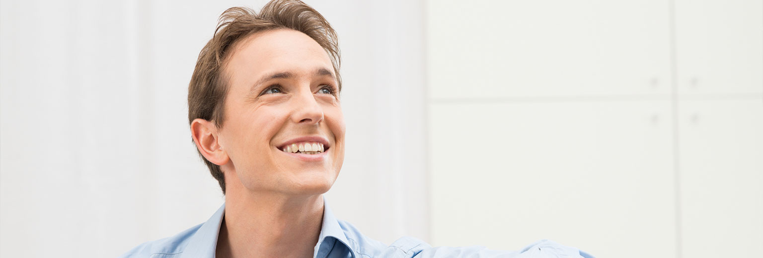 Man smiling after using Mouth Guards