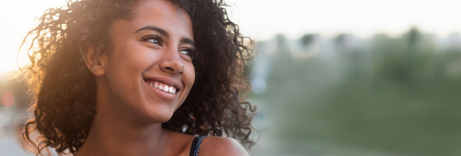 Woman smiling after Pocket Irrigation