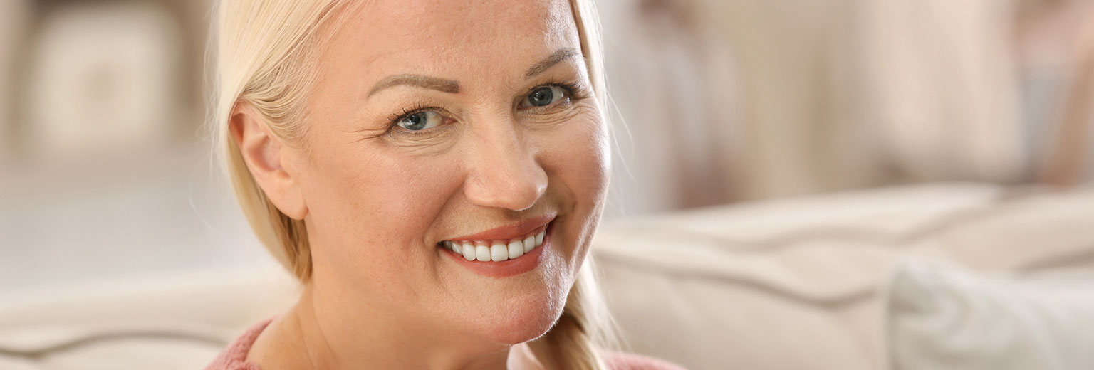 Woman smiling after Partial Dentures