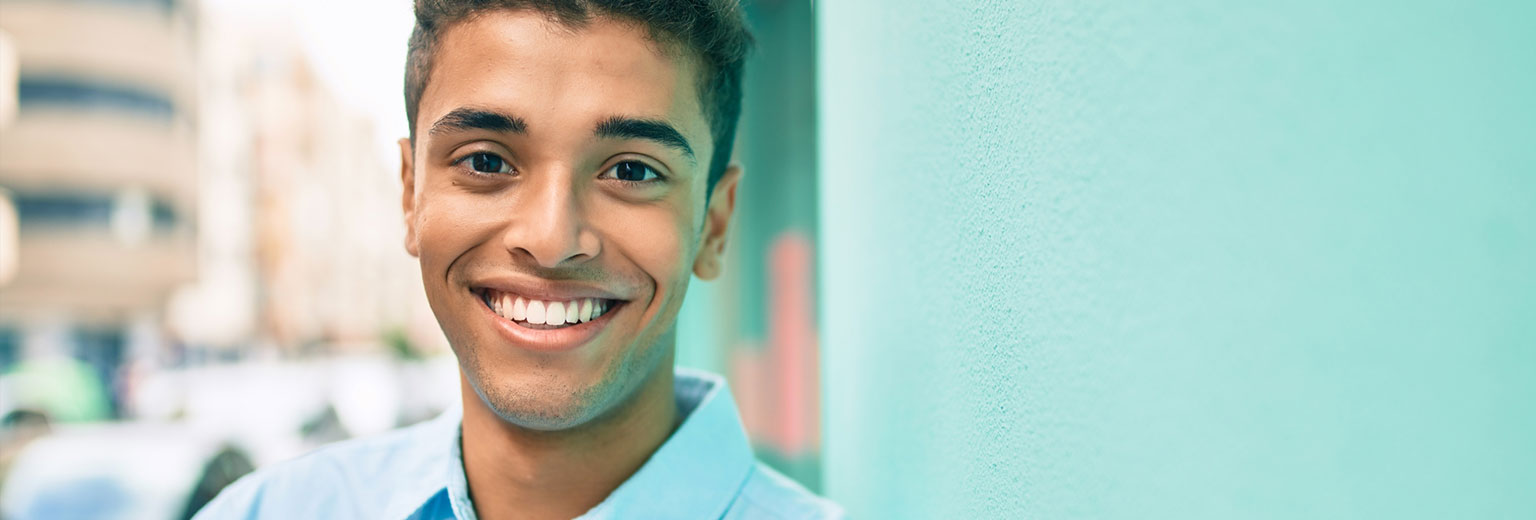 Man smiling after Porcelain Inlays & Onlays