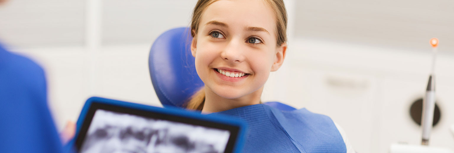 Woman smiling at dental